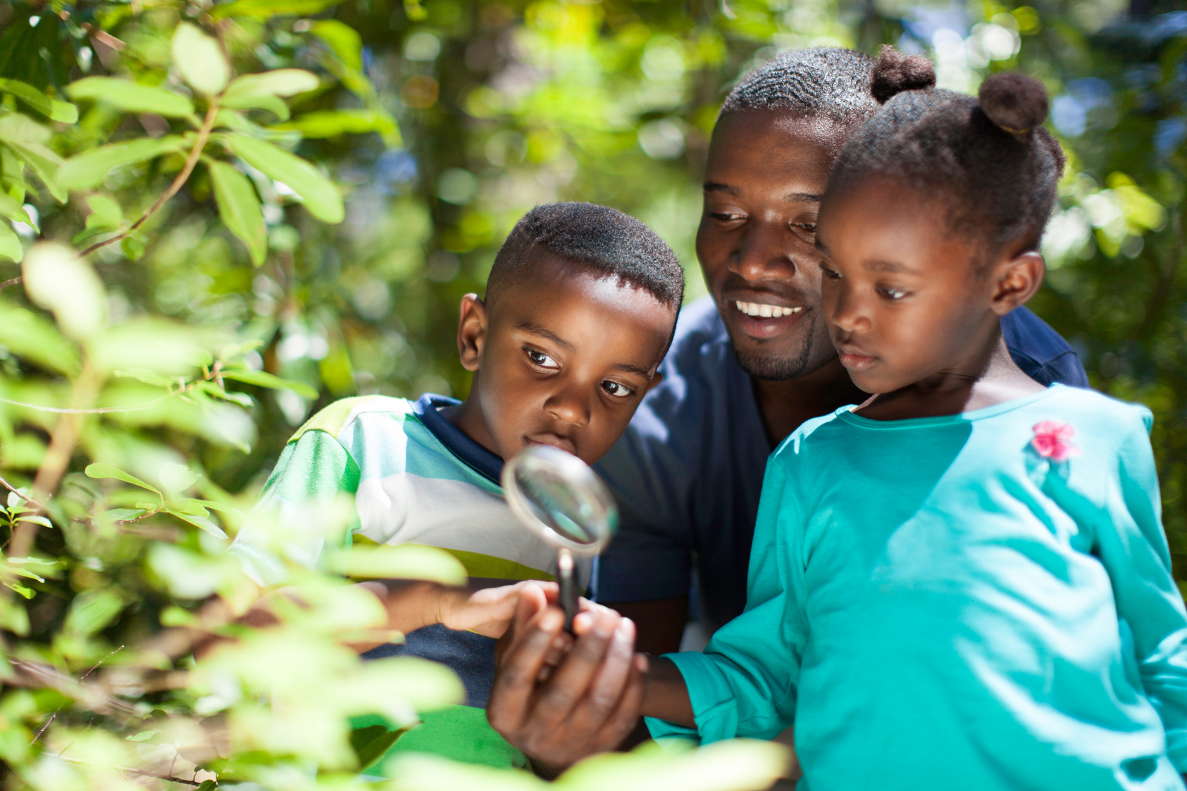 African family exploring nature together.